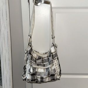 Angel Barcelo purse. Size medium. Multiple internal and external pockets.